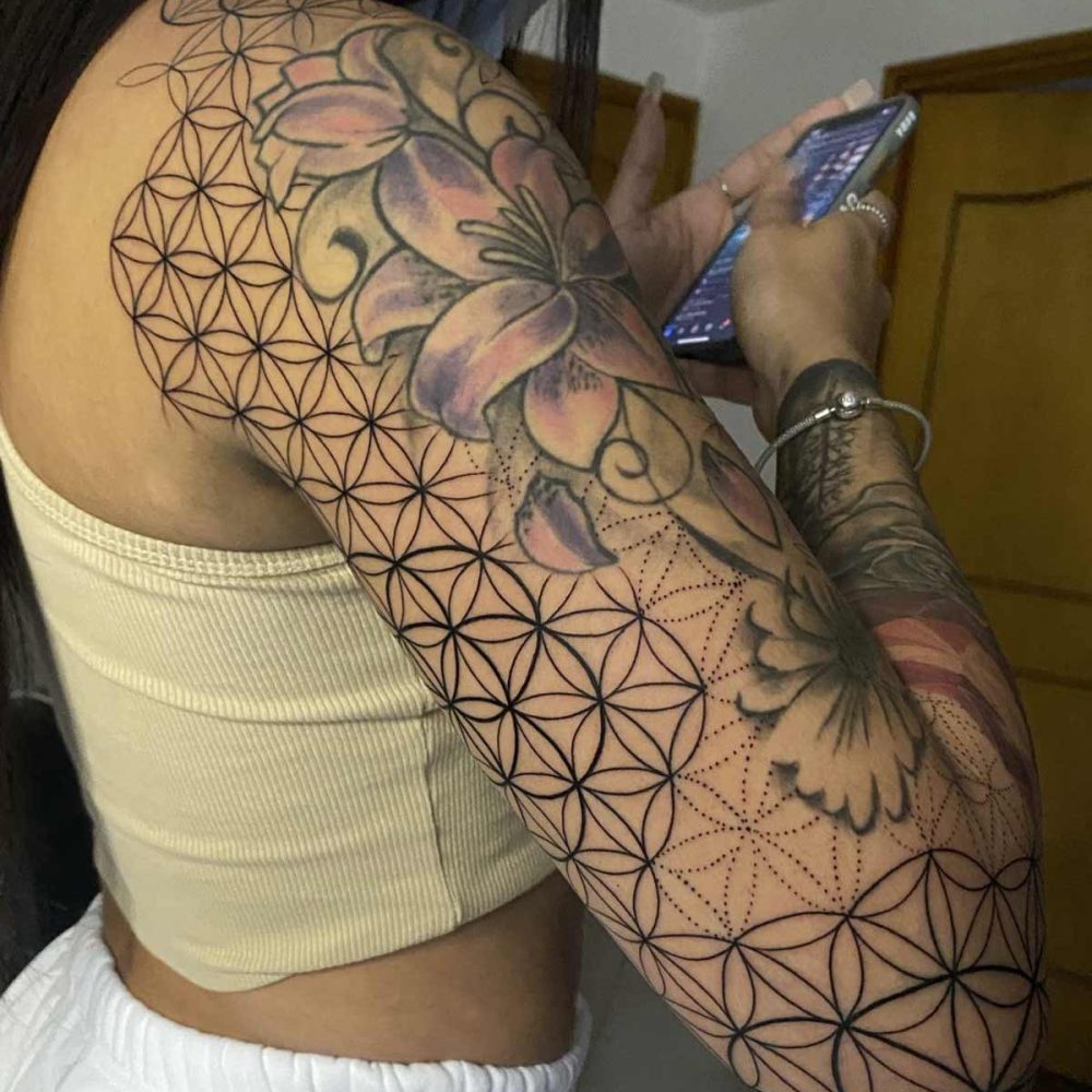 girl-sleevee-tattoo-flowers-geometric
